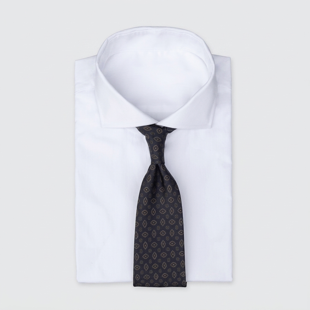 Deep navy blue men's necktie with diamond patterns in burnt orange & teal blue